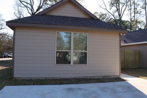 Photo of 9596 Darkwood Street, Willis, TX 77318 (MLS # 88936155)