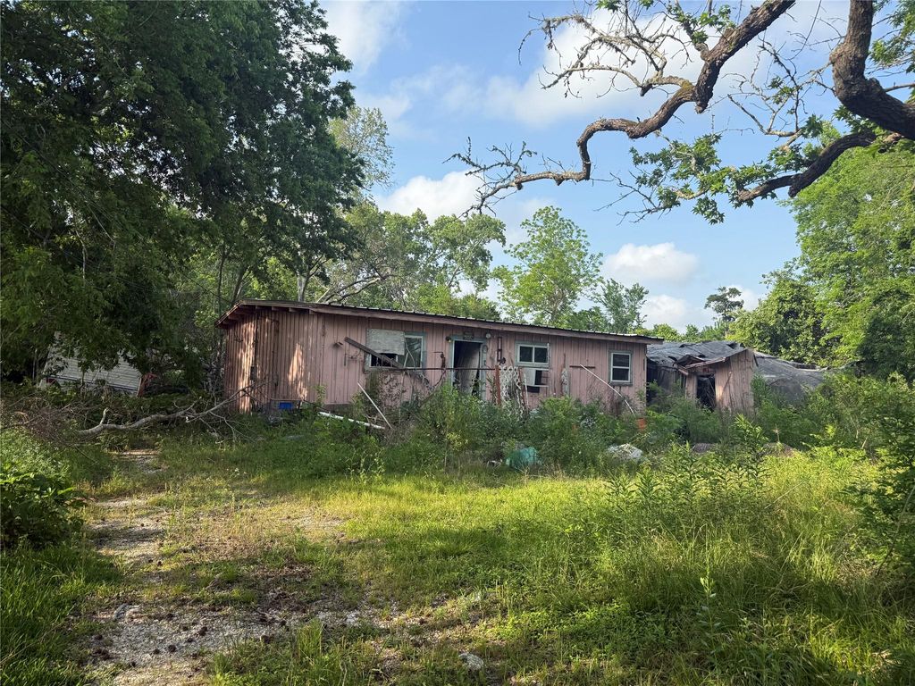 Photo of 1019 E Archer Road, Baytown, TX 77521 (MLS # 28569233)