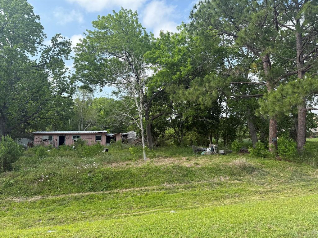 Photo of 1019 E Archer Road, Baytown, TX 77521 (MLS # 28569233)