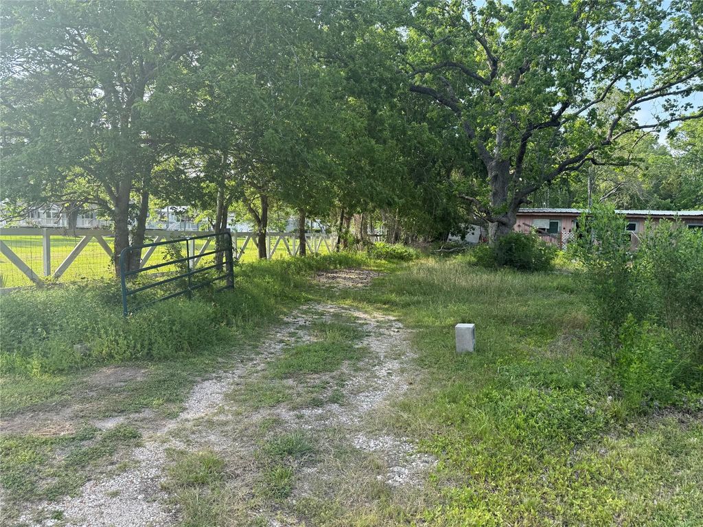 Photo of 1019 E Archer Road, Baytown, TX 77521 (MLS # 28569233)