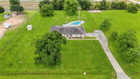 Photo of 302 Country Road 893, Angleton, TX 77515 (MLS # 42683438)
