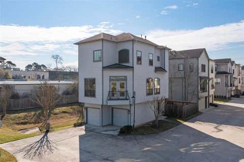 Photo of 835 Garden Oaks Trace, Houston, TX 77018 (MLS # 32447804)