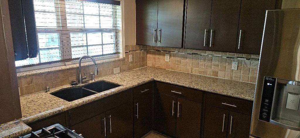 Photo of 5926 Hornwood Drive, Houston, TX 77081 (MLS # 77797633)