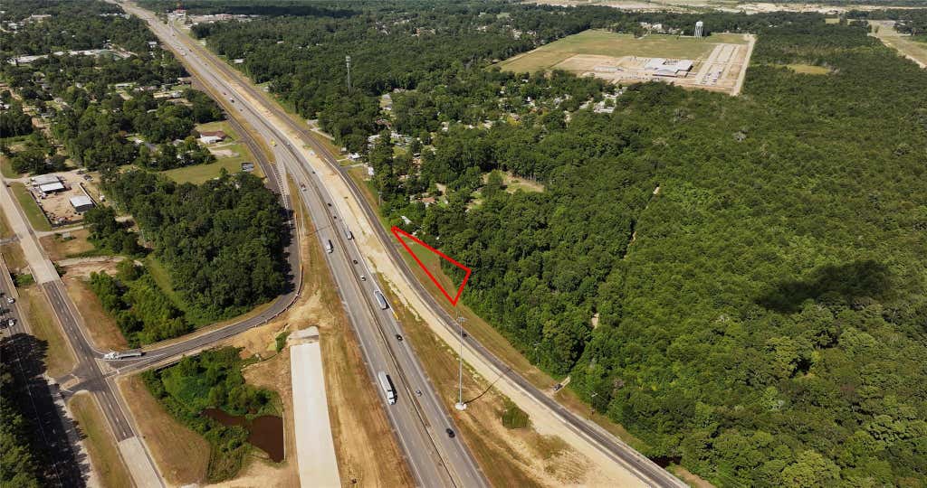 Photo of tbd S Hwy 59 Bypass, Cleveland, TX 77327 (MLS # 78189166)