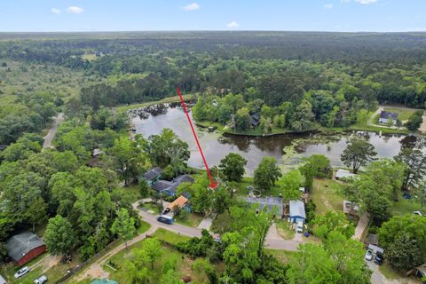 Photo of 11158 Quinlan North Lake Drive, Conroe, TX 77303 (MLS # 86307825)