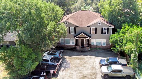 Photo of 1421 Avenue 20 1/2 Street #A /B, Huntsville, TX 77340 (MLS # 28364071)