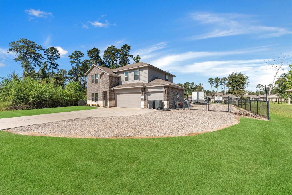 Photo of 919 Republic Road, New Caney, TX 77357 (MLS # 65219156)