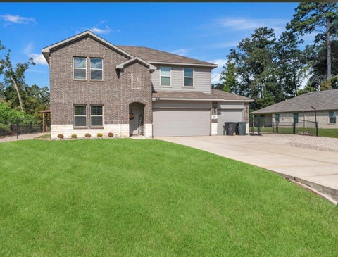 Photo of 919 Republic Road, New Caney, TX 77357 (MLS # 65219156)