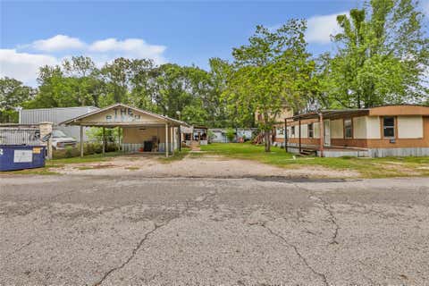 Photo of 21061 Brazos Drive, Porter, TX 77357 (MLS # 29626158)