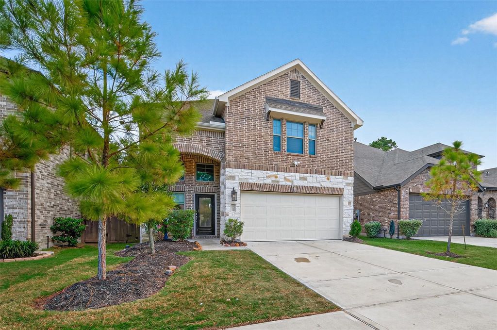 Photo of 12154 Texas Trumpet Trl, Humble, TX 77346 (MLS # 40741871)