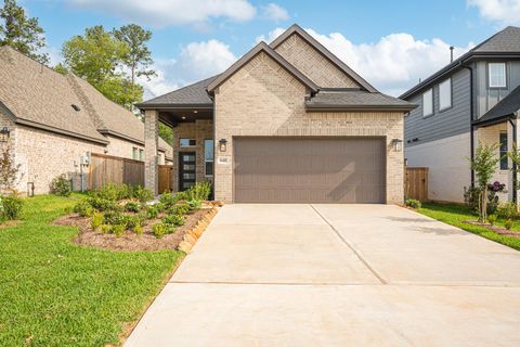 Photo of 648 Crested Duck Court, Willis, TX 77318 (MLS # 21648489)