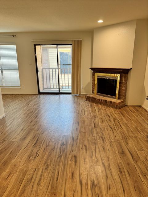 Photo of 16111 Aspenglenn Drive #404, Houston, TX 77084 (MLS # 50077280)