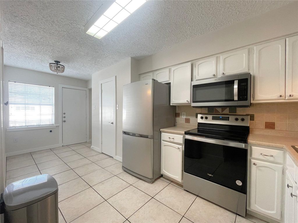 Photo of 443 N Post Oak Lane #443, Houston, TX 77024 (MLS # 82990844)