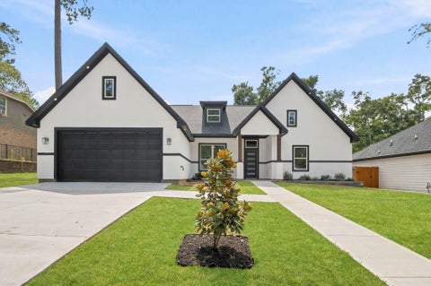 Photo of 12170 Mustang Avenue, Willis, TX 77378 (MLS # 69345420)