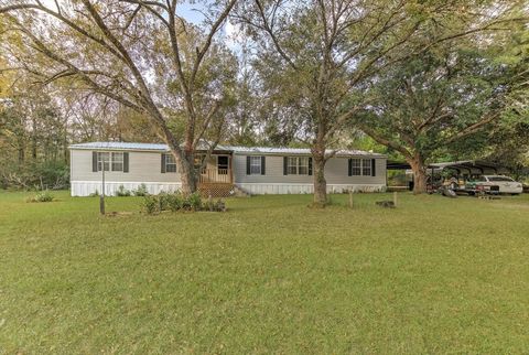 Photo of 102 County Road 2194 Road W, Cleveland, TX 77327 (MLS # 45629379)