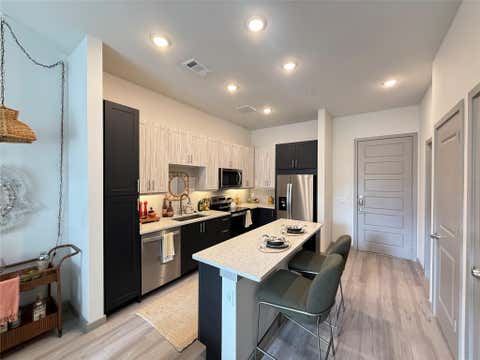 Photo of 11604 Stonehollow Dr DR #169, Austin, TX 78758 (MLS # 93376814)