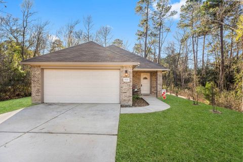 Photo of 15120 Arrowhead Loop E, Willis, TX 77378 (MLS # 98981895)