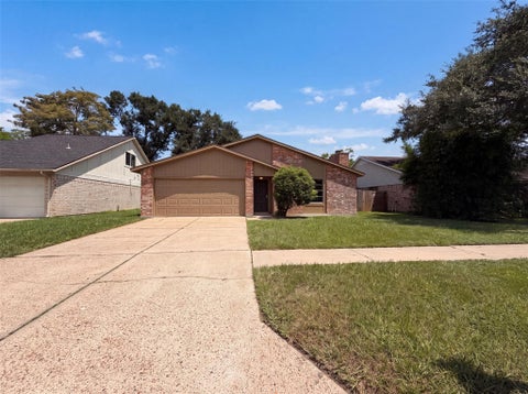 Photo of 5602 Briarwood Forest Drive, Houston, TX 77088 (MLS # 50956904)