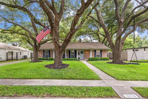 Photo of 10714 Piping Rock Lane, Houston, TX 77042 (MLS # 66203117)