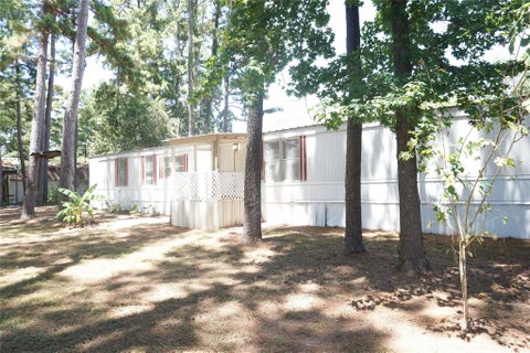 Photo of 10970 Maywood Street, Willis, TX 77318 (MLS # 54232901)