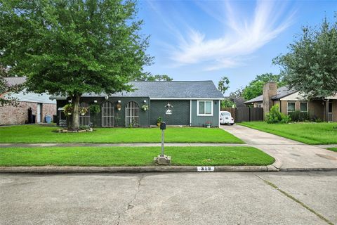 Photo of 319 Shady Glade Drive, Houston, TX 77090 (MLS # 40282727)