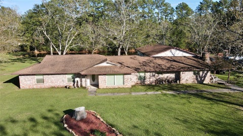 Photo of 585 County Road 3796, Cleveland, TX 77328 (MLS # 85736502)
