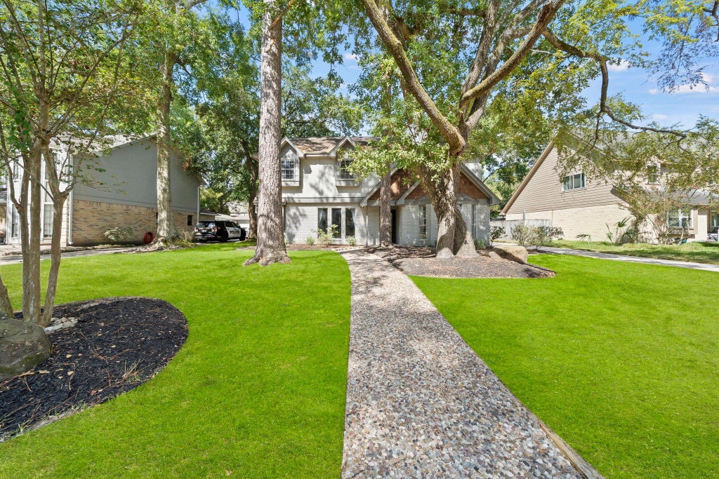 Photo of 3319 Three Pines Drive, Houston, TX 77339 (MLS # 19980553)