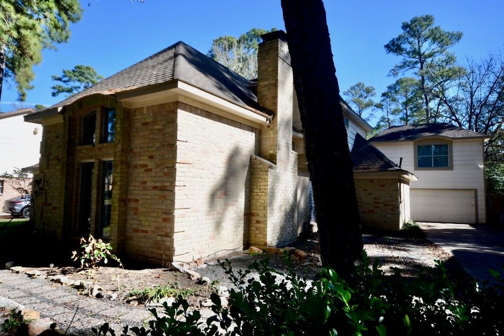 Photo of 2706 Woodland Grove Drive, Houston, TX 77339 (MLS # 13990418)