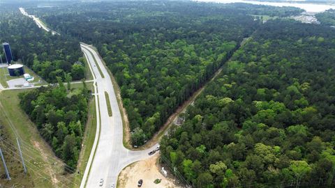 Photo of 0 Fm 830, Conroe, TX 77304 (MLS # 62252936)