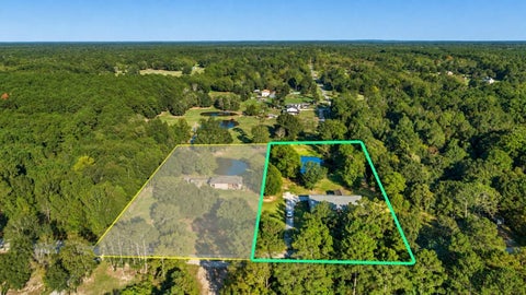 Photo of 448 County Road 2235, Cleveland, TX 77327 (MLS # 66868111)