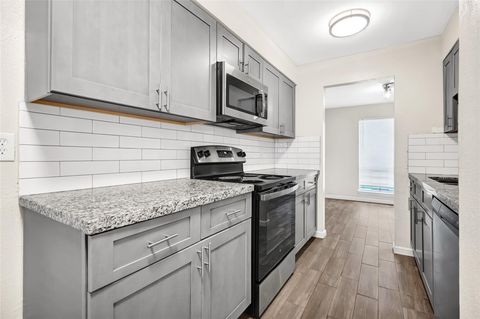 Photo of 6358 Creekbend Drive #102, Houston, TX 77096 (MLS # 88498887)