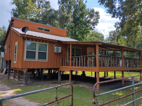 Photo of 260 County Road 360, Splendora, TX 77372 (MLS # 94403864)
