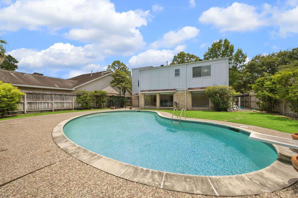 Photo of 10314 Olympia Drive, Houston, TX 77042 (MLS # 93275913)