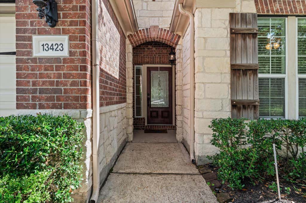 Photo of 13423 Hartland Lake Lane, Houston, TX 77044 (MLS # 33670742)