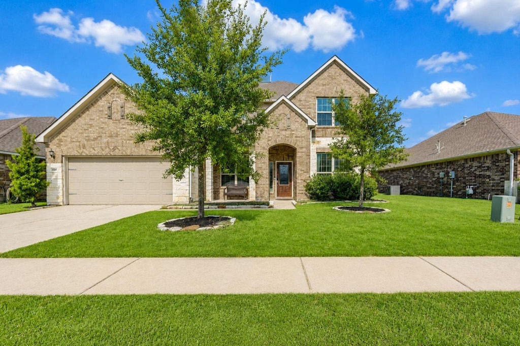 Photo of 24506 Raven Cliff Falls Drive, Tomball, TX 77375 (MLS # 40759135)