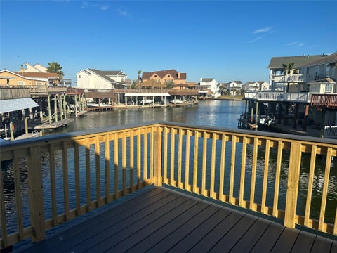 Photo of 306 Isles End Road, Tiki Island, TX 77554 (MLS # 86682074)