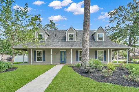 Photo of 402 Pine Manor Dr Dr, Conroe, TX 77385 (MLS # 73629833)