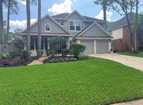 Photo of 26 Merit Woods Place, The Woodlands, TX 77382 (MLS # 22283247)