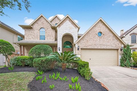 Photo of 10223 Kessler Cove Lane, Katy, TX 77494 (MLS # 31725255)