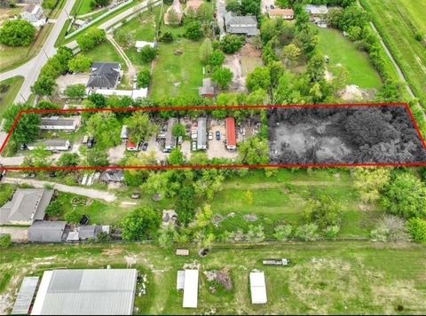 Photo of 3182 Brownie Campbell Rd Road, Houston, TX 77038 (MLS # 32202101)
