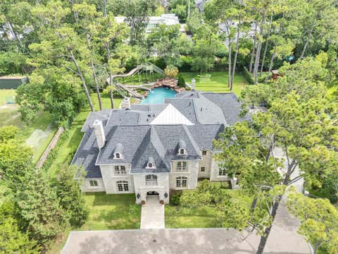 Photo of 11527 Green Oaks Drive, Houston, TX 77024 (MLS # 64059590)