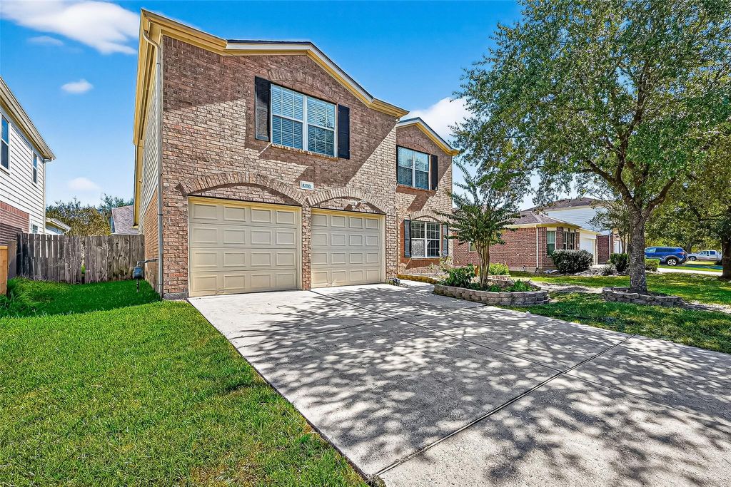 Photo of 4730 Pin Oak Creek Lane, Houston, TX 77345 (MLS # 6419269)
