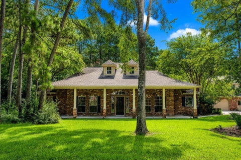 Photo of 10034 Crestwater Circle, Magnolia, TX 77354 (MLS # 22261833)