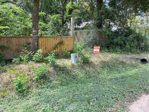 Photo of 1712 N Travis Avenue, Cleveland, TX 77327 (MLS # 95787469)