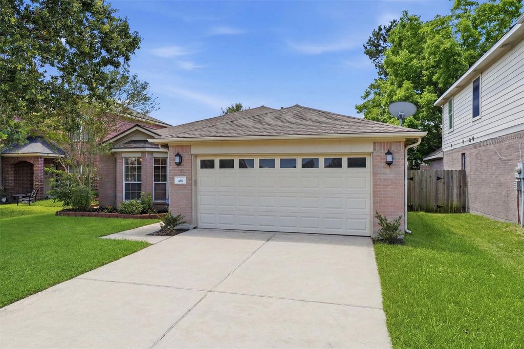 Photo of 418 Mystic Trail Loop, Houston, TX 77339 (MLS # 21530699)