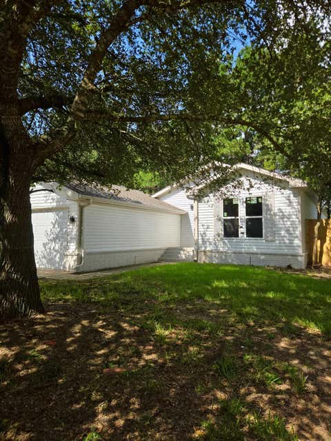 Photo of 16222 Wild Oak Lane, Conroe, TX 77302 (MLS # 74914592)