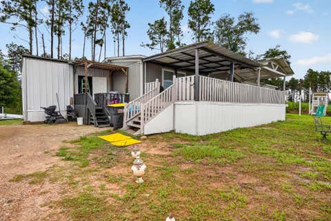 Photo of 125 Road 5807, Cleveland, TX 77327 (MLS # 56460335)