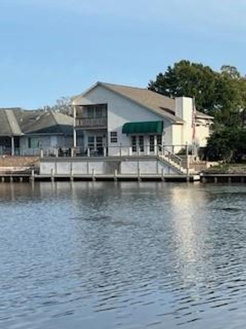 Photo of 1409 West Lake Shores Circle N, Huntsville, TX 77340 (MLS # 50303603)