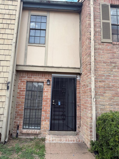 Photo of 9901 Sharpcrest Street #E6, Houston, TX 77036 (MLS # 76610642)