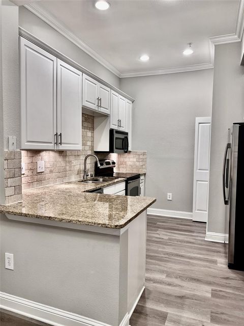 Photo of 5353 Memorial Drive #1045, Houston, TX 77007 (MLS # 29837671)